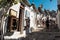 Tourist visit Alberobello famous for Trulli houses, Italy