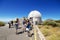 Tourist visiting telescopes at Teide astronomical observatory on July 7, 2015 in Tenerife, Canary Island, Spain.