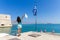 Tourist visitor woman siteseeing at Heraklion Venetian port, Cre
