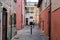 A tourist visits the ancient district of San Giuliano
