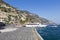 Tourist waiting for the yachts in Amalfi dock