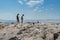 Tourist waling at the rock on the top of Areopagus  Hill at a sunny day