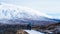 Tourist walk in Iceland volcanic landscape moutnian background