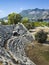 Tourist walking along ruins of Theatre in Letoon Ancient City in village Kumluova, Turkey. Sunny day, Greek culture