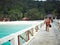 Tourist walking at the jetty going to the the island upon arrival.