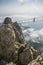 Tourist walking on rope bridge on the Mount Ai-Petri, Crimea