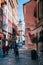 Tourist walking on small alley with vintage buildings in Vevey, Switzerland