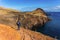 Tourist walking on a trekking path at Ponta de Sao Lourenco, Madeira