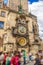 Tourist walking under the Orloj clock