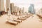 Tourist walks barefoot in the sand between rows of sun loungers and beach umbrellas in the JBR district in Dubai. Holidays