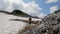 A tourist walks through the mountain pass