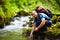 Tourist washing hands in a river