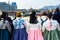 Tourist watching the warriors of the Royal guard in historical costumes in daily Ceremony of Gate Guard Change near the