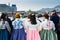 Tourist watching the warriors of the Royal guard in historical costumes in daily Ceremony of Gate Guard Change near the