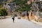 Tourist wearing medical face mask in ancient city of Myra in Demre, Antalya province in Turkey