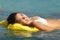 Tourist woman bathing in a tropical sea