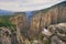 Tourist woman on the edge of a cliff of Tazi Canyon in Manavgat, Antalya, Turkey. Greyhound Canyon, Wisdom Valley.