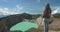 Tourist woman enjoy volcanic Kelimutu lakes view