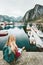 Tourist woman enjoying fjord view of Lofoten islands