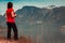 Tourist woman enjoying fjord view in Norway