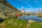 Tourist woman at Matterhorn on Riffelsee Lake