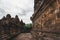 tourist woman run exploring between borobudur temple wall, famous travel destination on indonesia