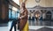 Tourist woman with suitcase on platform station in Barcelona. Girl traveler waiting train enjoy holiday weekend vacation