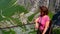 Tourist woman on Trollstigen viewpoint