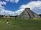 Tourist and the wonderful pyramid of Chichen Itza.