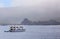 Tourist yacht anchored near Santiago Island in Galapagos National Park, Ecuador