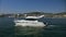 Tourist Yacht Cruising along Cannes Beach, France