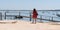 Tourist young woman on Cap Ferret Herbe port at Arcachon berry in France look atlantic beach in web banner template