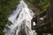 Tourist at Yutaki waterfall in Nikko national park, Japan