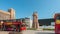 Touristbus in front of the Latvian Riflemen monument