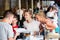 Touristic family relaxing in cafe looking map