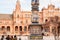 Touristic landmark with columns with ceramic tiles and walls of the famous Plaza de Espana, Andalusia, Sevilla