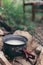 Touristic metal bowler pot. Cooking at the campsite, picnic, outdoor recreation. Compact and light tourist equipment. outdoor.