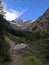 Touristic path in the mountains marked with yellow signs.