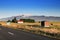 Touristic road in Iceland. Small farm near the road.