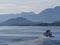 Touristic ship at beauty fjord near european Alesund town in Norway