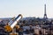 Touristic telescope overlooking Eiffel Tower