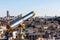 Touristic telescope overlooking Paris from the roof of the building. France