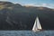 Touristic yacht next to Northern Ireland shoreline