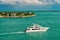 Touristic yachts floating by green island at Key West, Florida