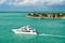 Touristic yachts floating by green island at Key West, Florida