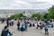 Tourists admiring the skyline of Paris from the Sacre Coeur