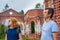 Tourists adult man and teenage girl exploring ruined Lutheran church in Lahdenpohja, Karelia, Russia. Cognitive tourism, active