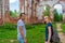 Tourists adult man and teenage girl exploring ruined Lutheran church in Lahdenpohja, Karelia, Russia. Cognitive tourism, active