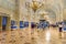 Tourists in the Alexander Hall of State Hermitage Museum. Saint Petersburg. Russia