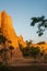 Tourists at ancient scenic landscape at sunset. The Sao Din Na Noi site displays picturesque scenery of eroded sandstone pillars,